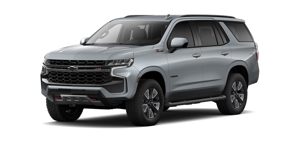 Chevrolet Tahoe 2023, SUV con 3 filas de asientos en color gris tiburon